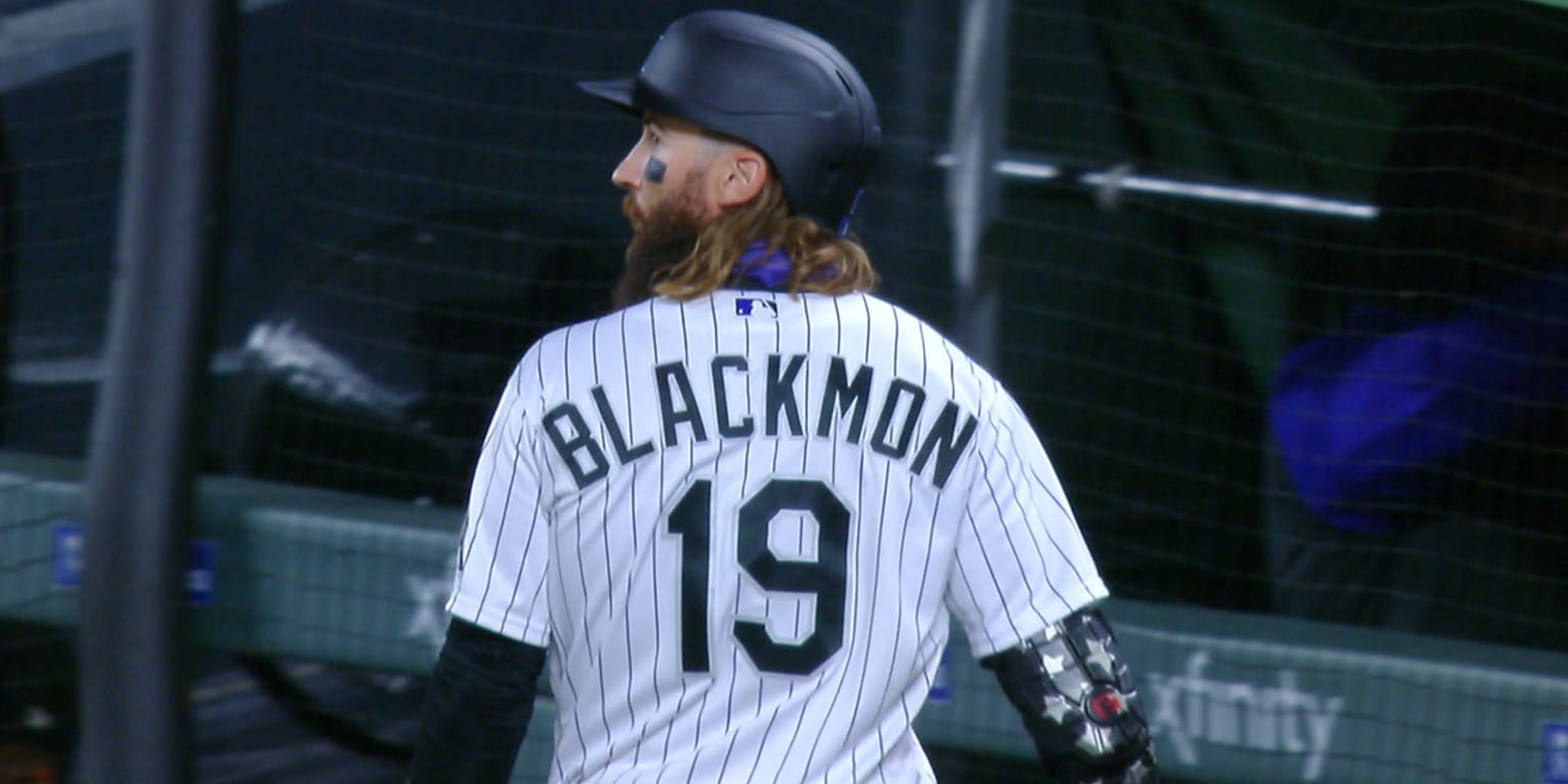 Charlie Blackmon 19 Colorado Rockies baseball player action pose