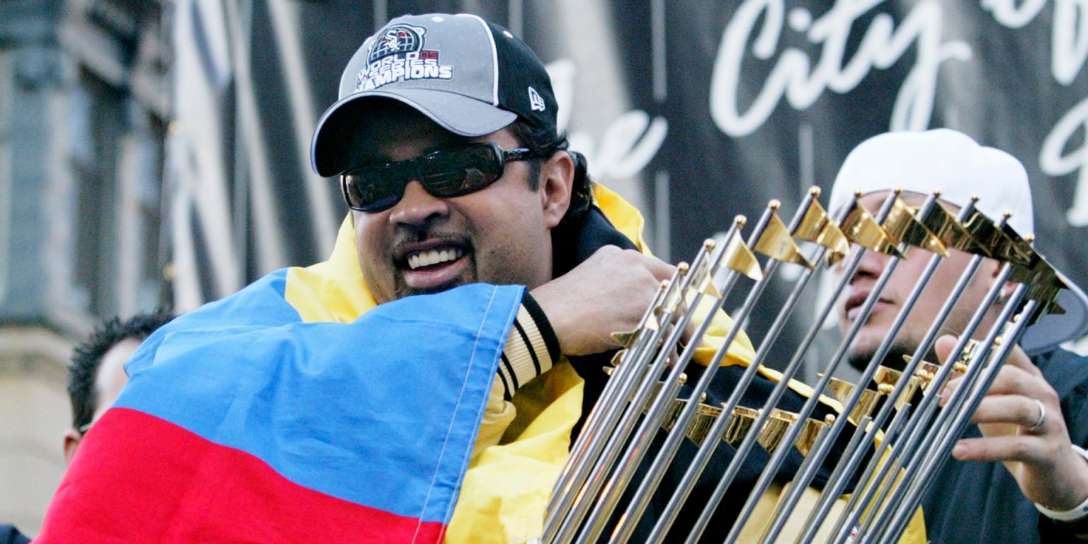 Chicago White Sox manager Ozzie Guillen watches his team bat in