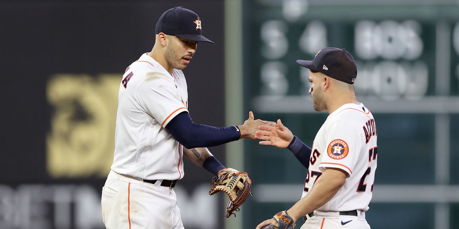 Download George Springer Houston Astros Holding A Water Bottle