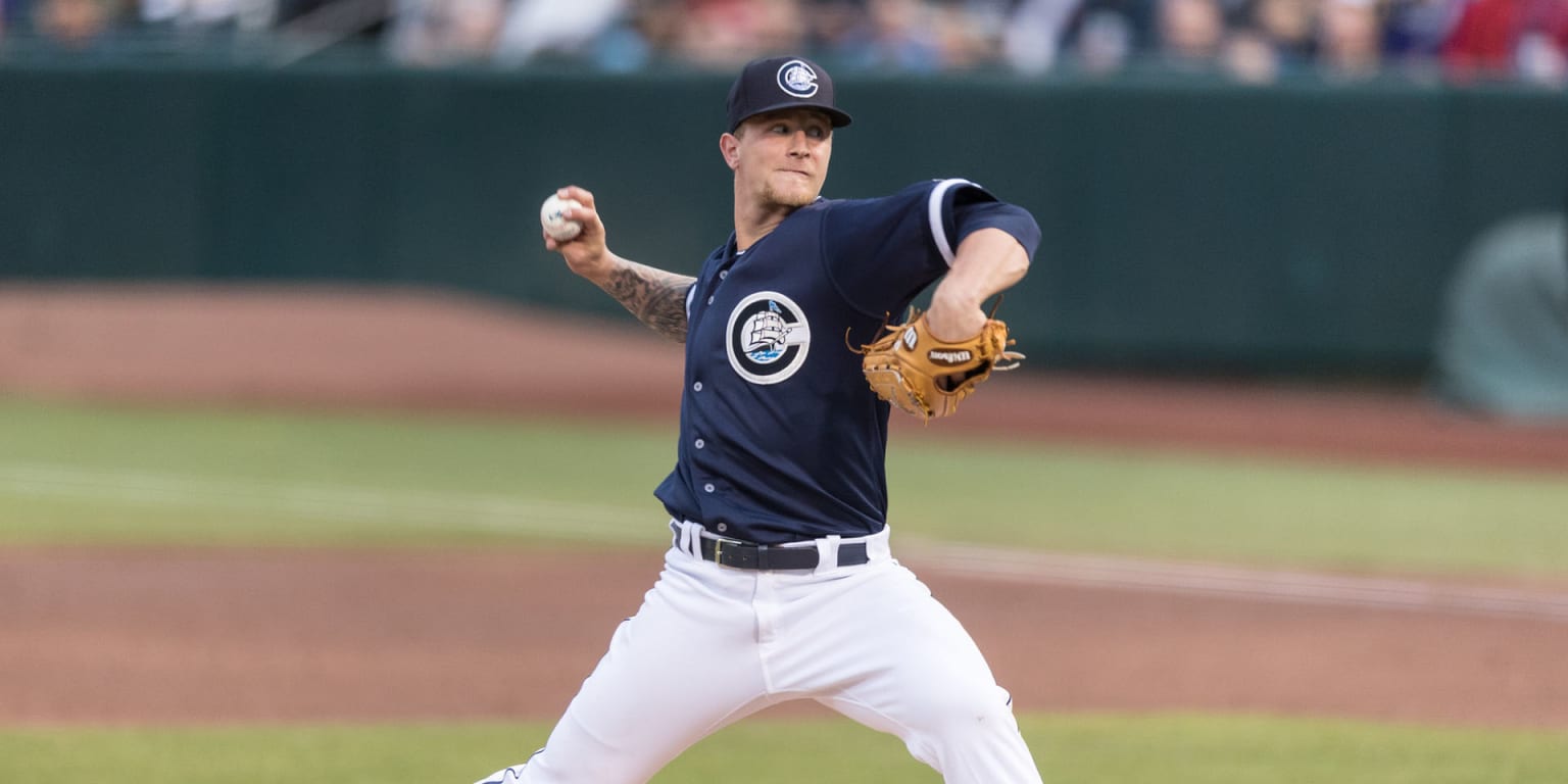 Cleveland Indians pitcher Zach Plesac catches the ball at first