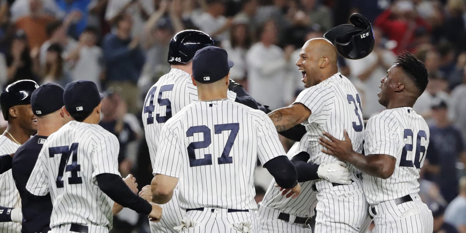 Yankees clinch Wild Card berth with extras win