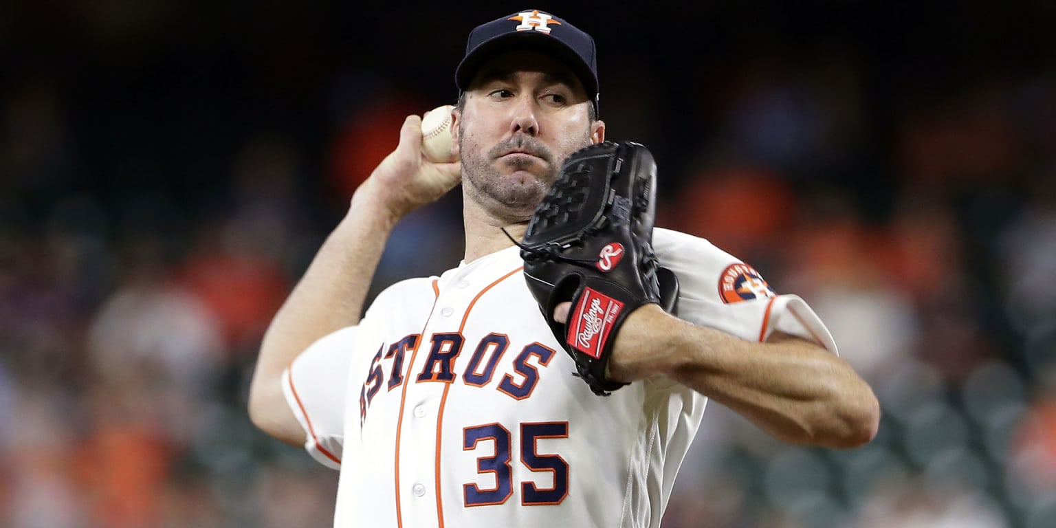 Houston Astros pitcher Justin Verlander (L) and New York Yankees outfielder  Aaron Judge (C) share a smile during MLB's All-Star Game at Nationals Park  in Washington, D.C., July 17, 2018. Photo by