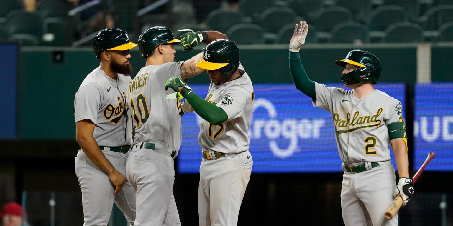 Pinder's 12th-inning slam lifts A's over Rangers 14-7