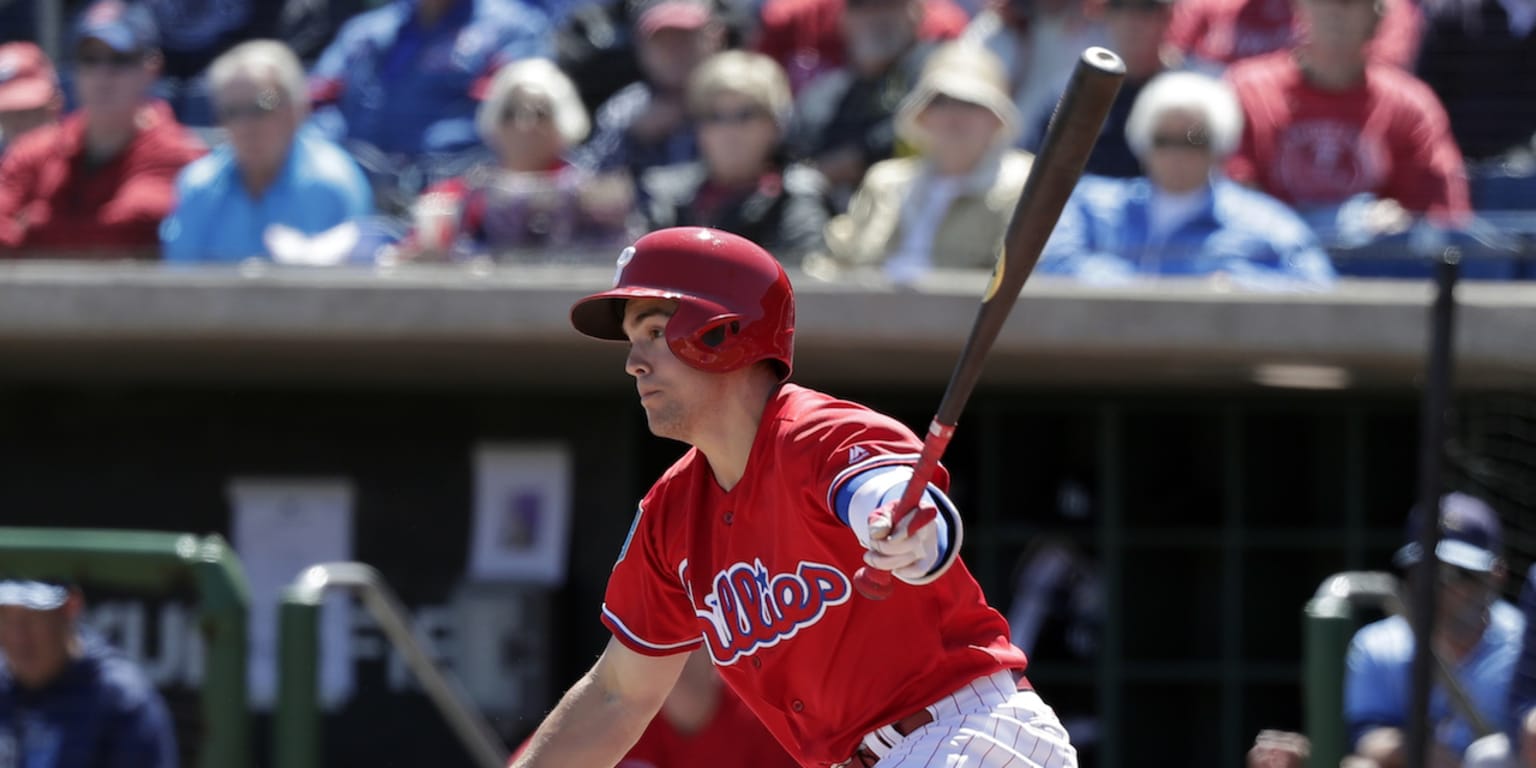 Philadelphia Phillies shortstop Scott Kingery (4) throws to first base  during a spring training baseball game against the Philadelphia Phillies on  March 26, 2023 at Ed Smith Stadium in Sarasota, Florida. (Mike