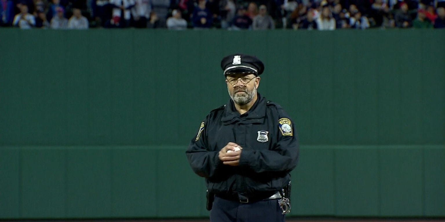 Cincinnati police honor Boston-area officer who was shot wearing Reds jersey