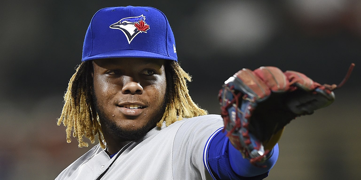 Vlad Guerrero Jr. talks with David Ortiz in Boston