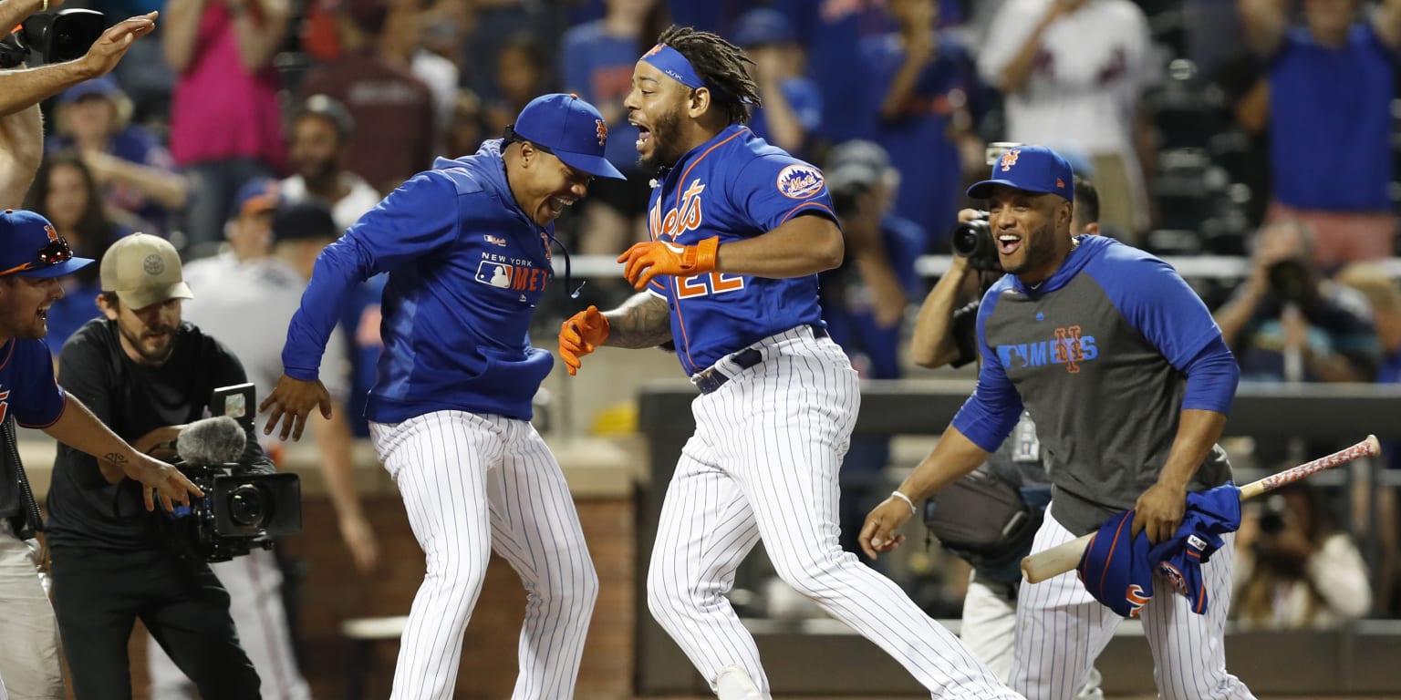 New York Mets' Dominic Smith gestures as he runs the bases after a  game-tying home run in the ninth inning of the team's baseball game against  the Atlanta Braves on Thursday, July