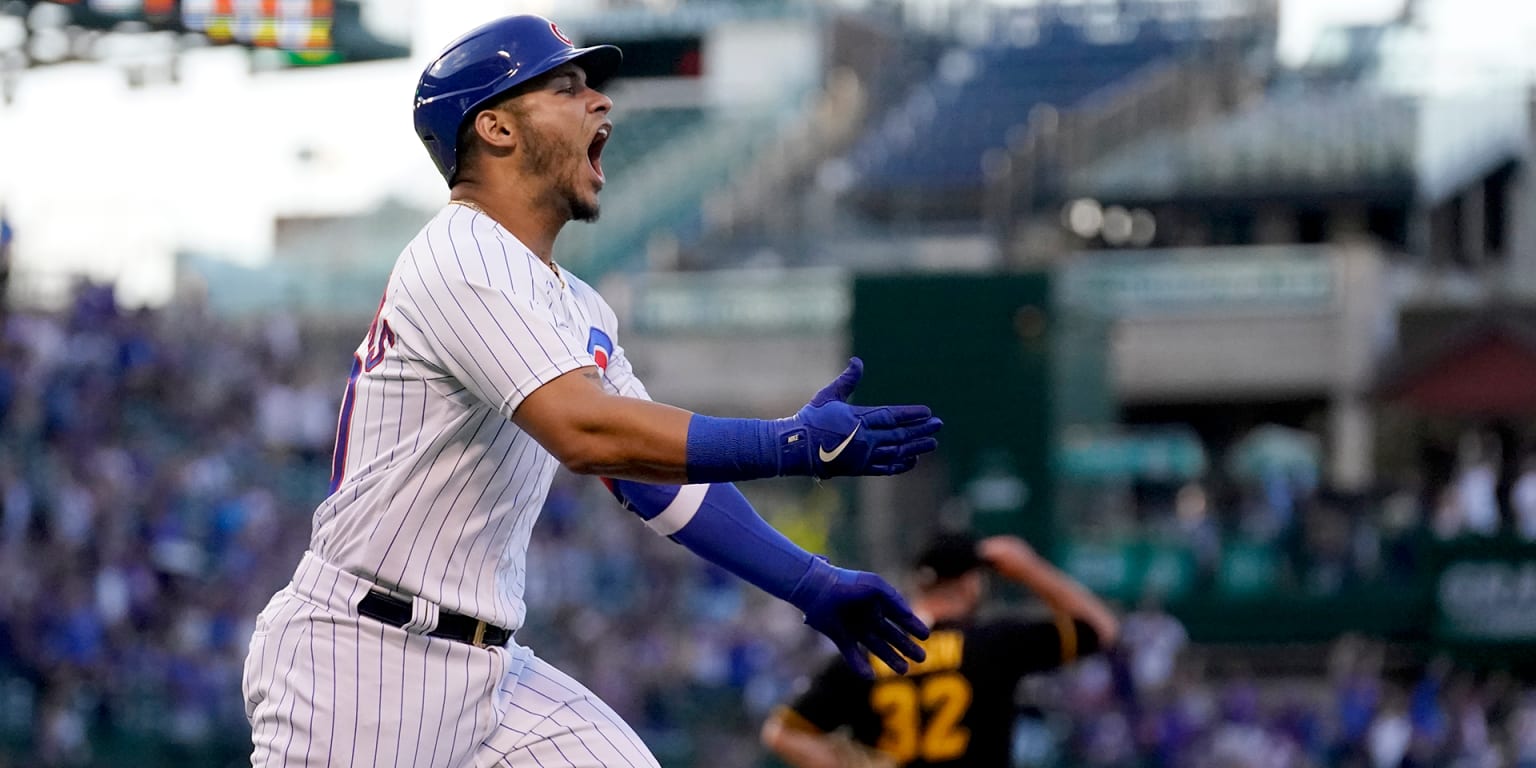 CHICAGO -- As Willson Contreras rounded second base on Monday night, he began waving emphatically in the direction of Wrigley Field's packed bleachers. The Cubs star certainly waved hello to some history, too.
In a wild first inning, Contreras launched a gran…