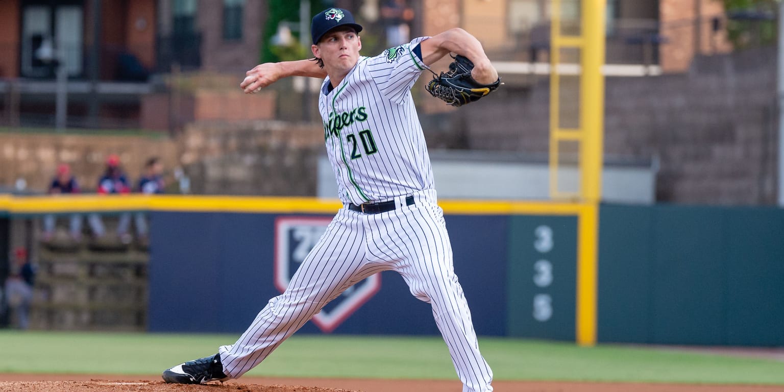 Atlanta Braves left fielder Lane Adams wears a jersey sporting a