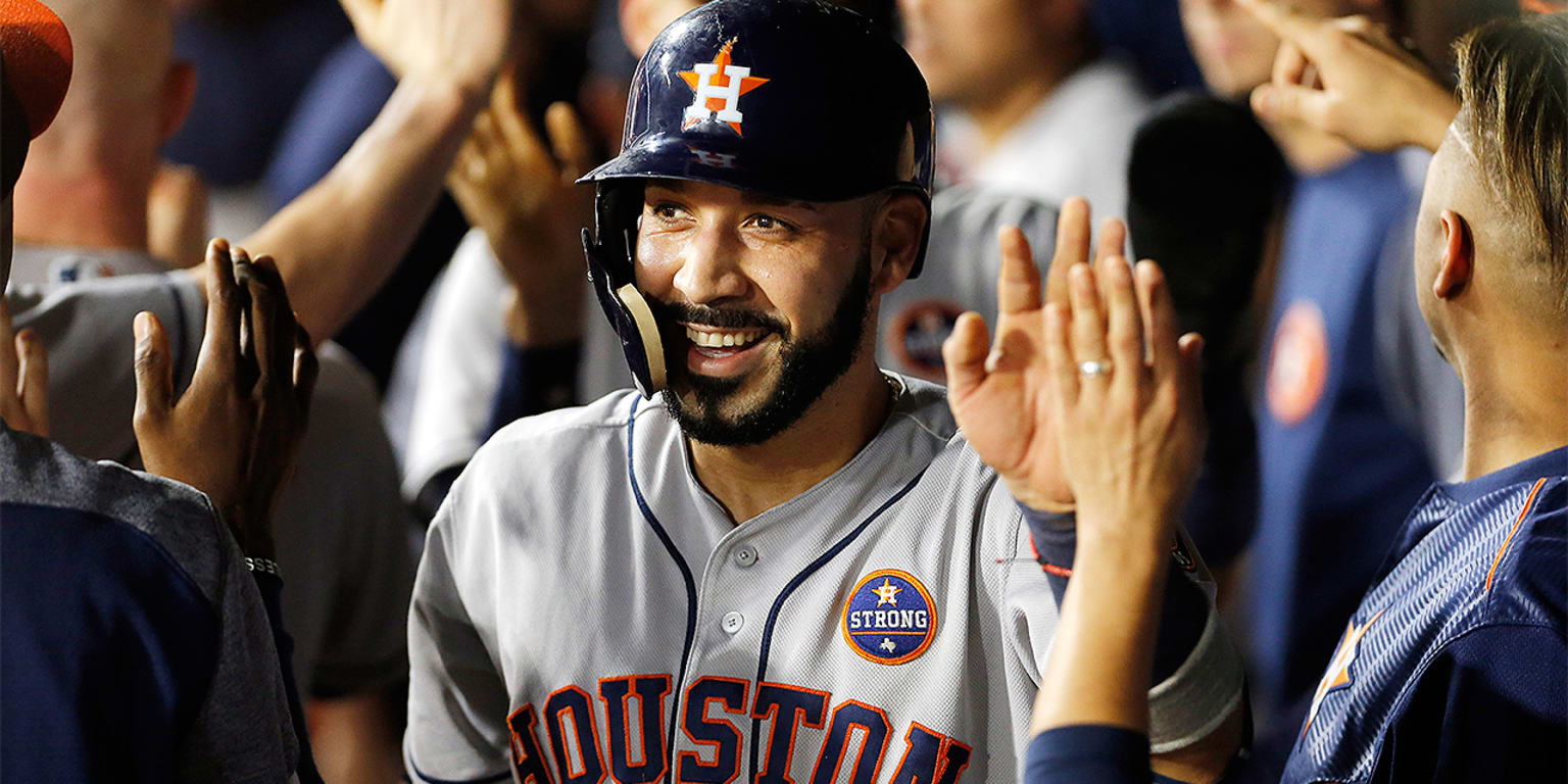 Houston, TX, USA. 9th Apr, 2017. Houston Astros first baseman Marwin  Gonzalez (9) signs a kids shirt prior to the start of the MLB game between  the Kansas City Royals and the