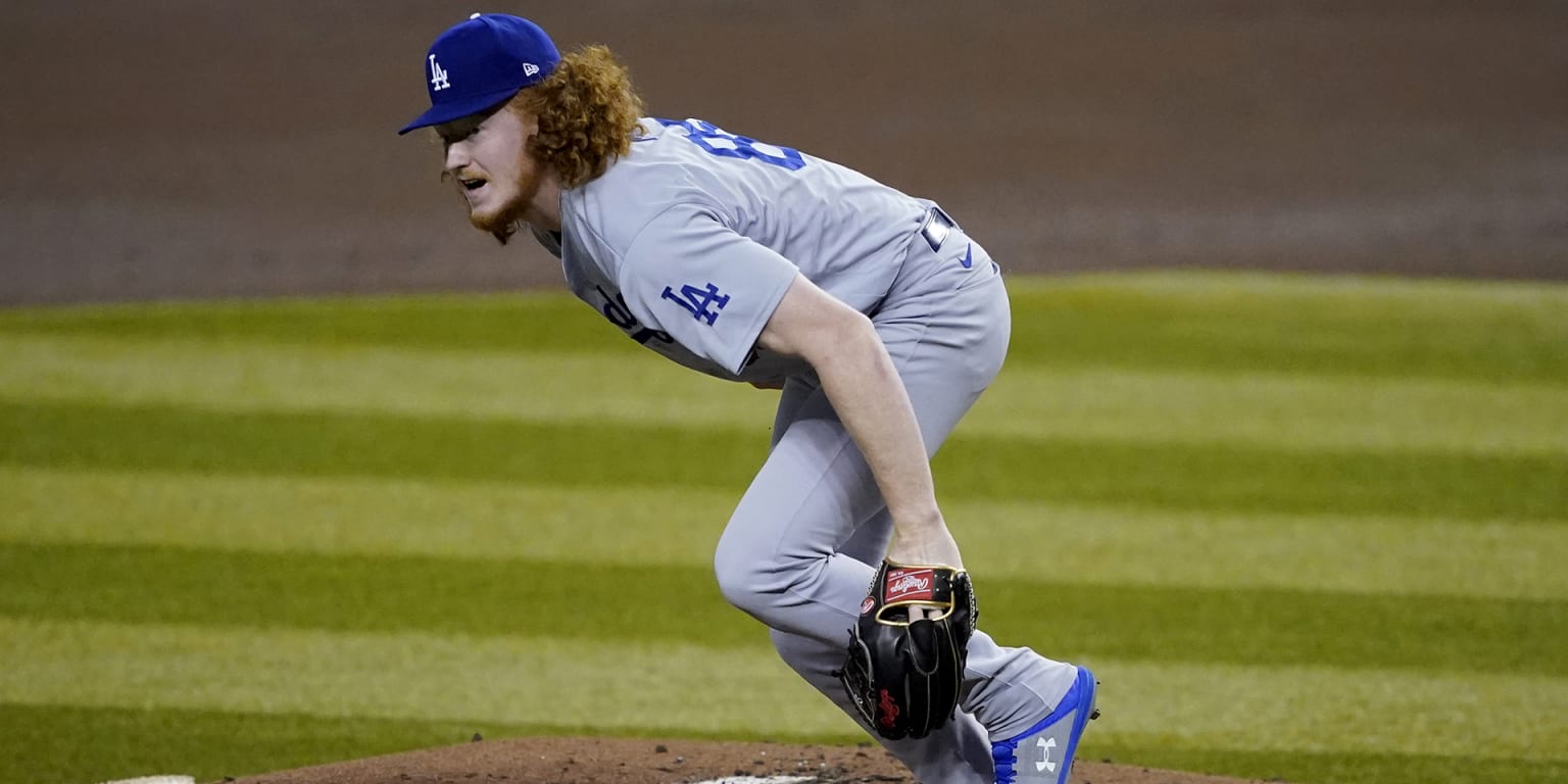 Los Angeles Dodgers' Dustin May takes liner off head during game