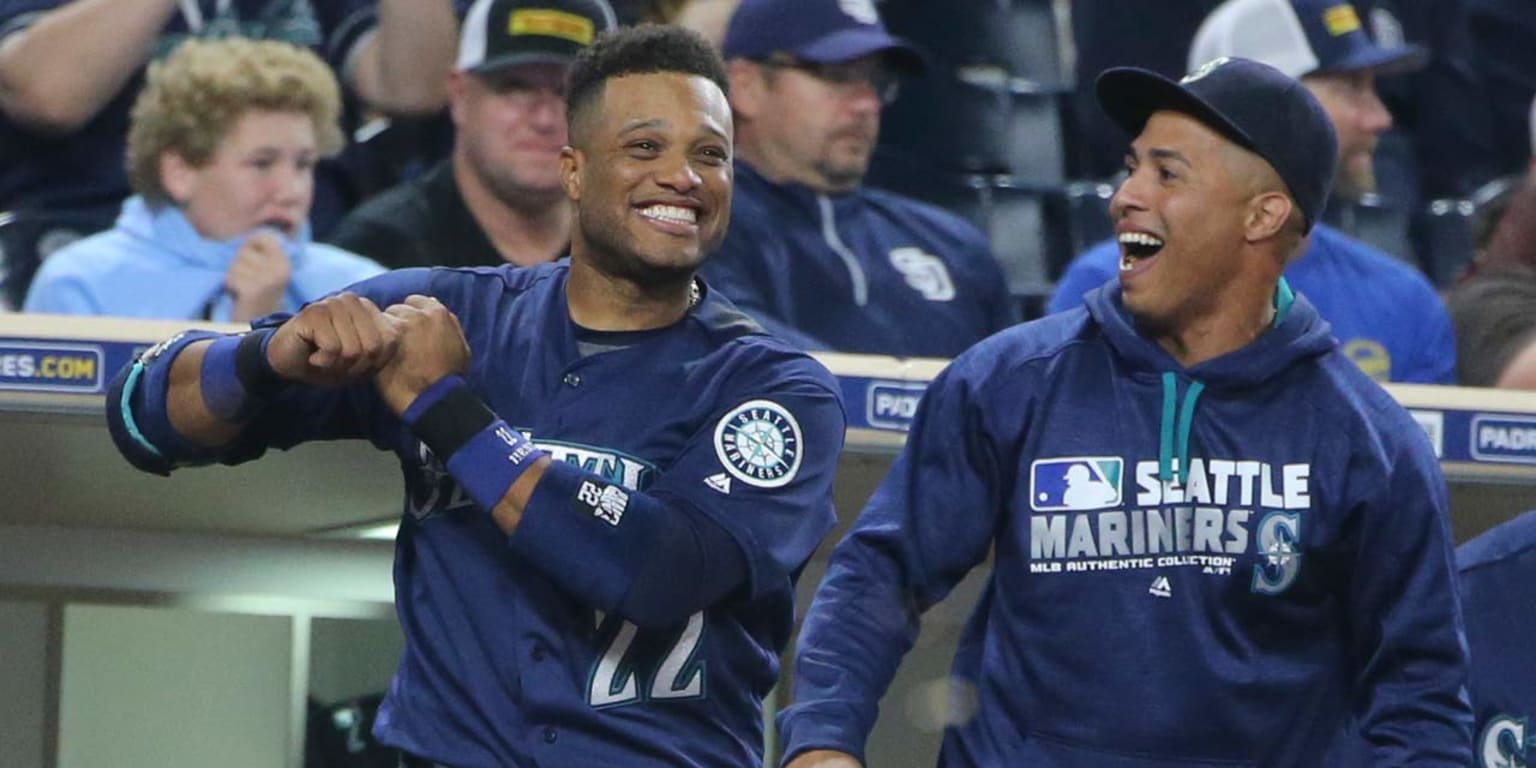 Seattle Mariners first baseman Dae-Ho Lee bats reacts after