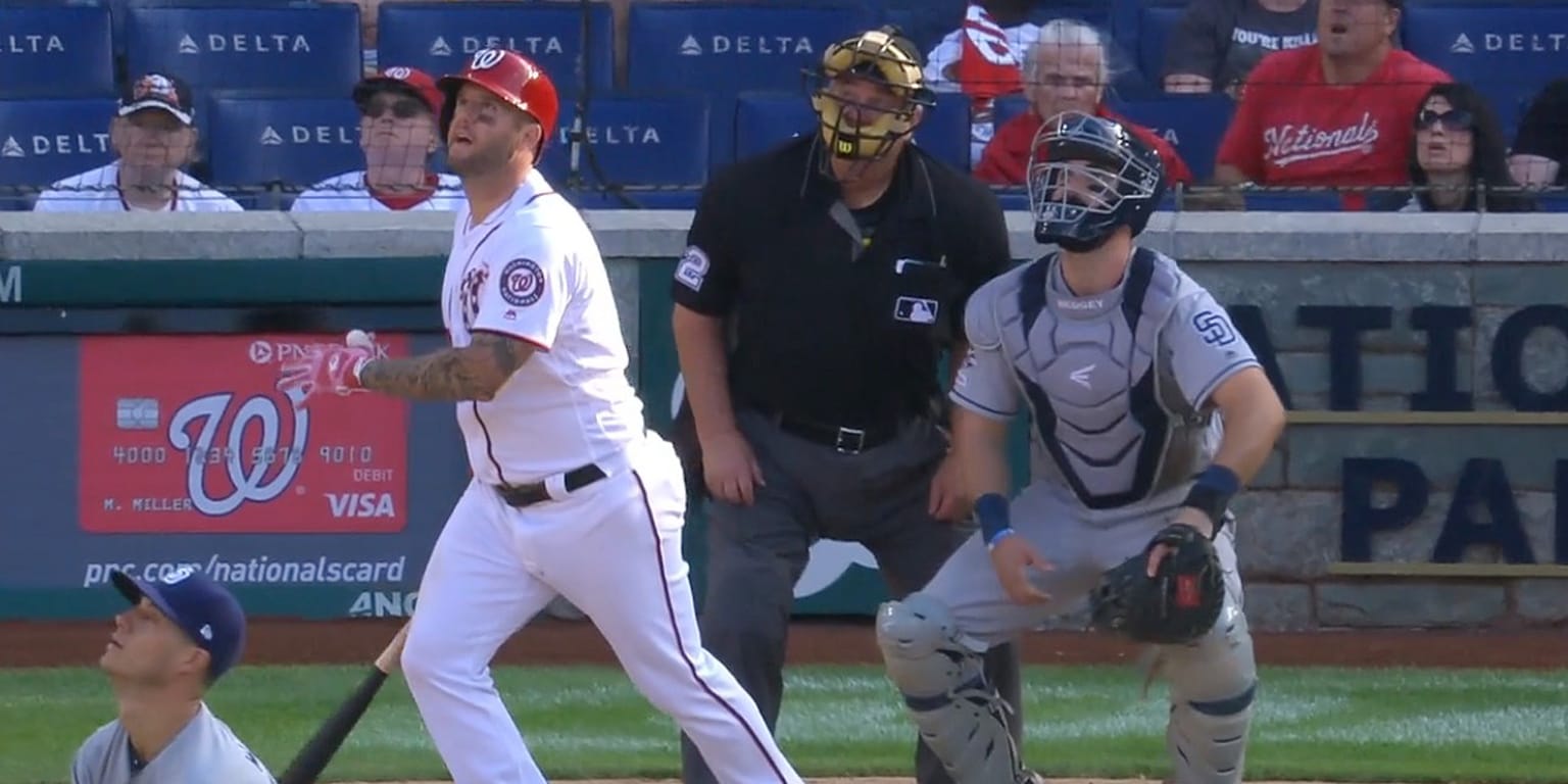 Washington Nationals' Victor Robles climbs the steps to the dugout