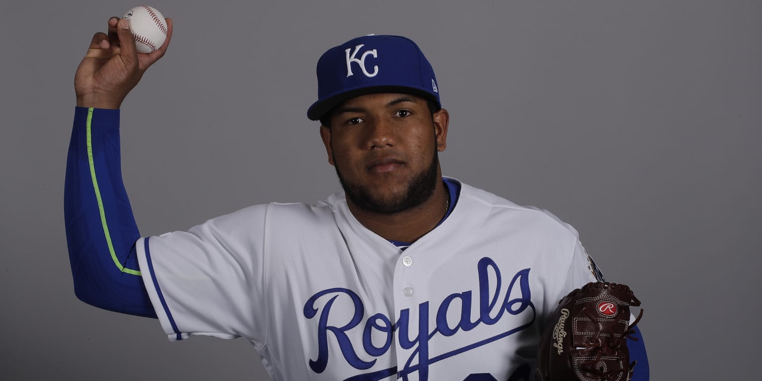 Kansas City Royals manage Ned Yost (L) relieves rookie starting