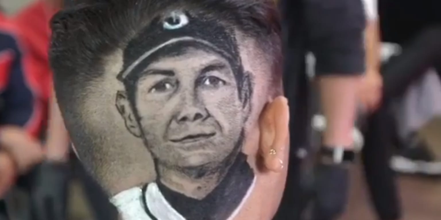 This kid got Edgar Martinez's face shaved and painted into the back of his  head