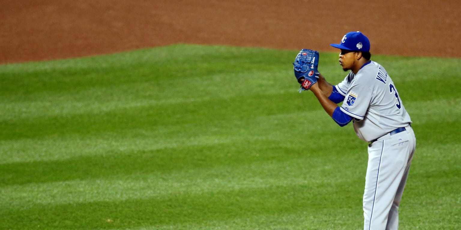 Kansas City Royals pitcher Edinson Volquez (36) talks to catcher