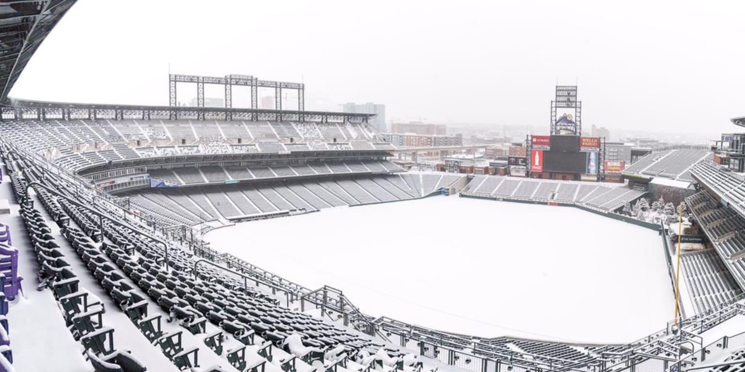 Coors Field covered in hail after storm in Denver