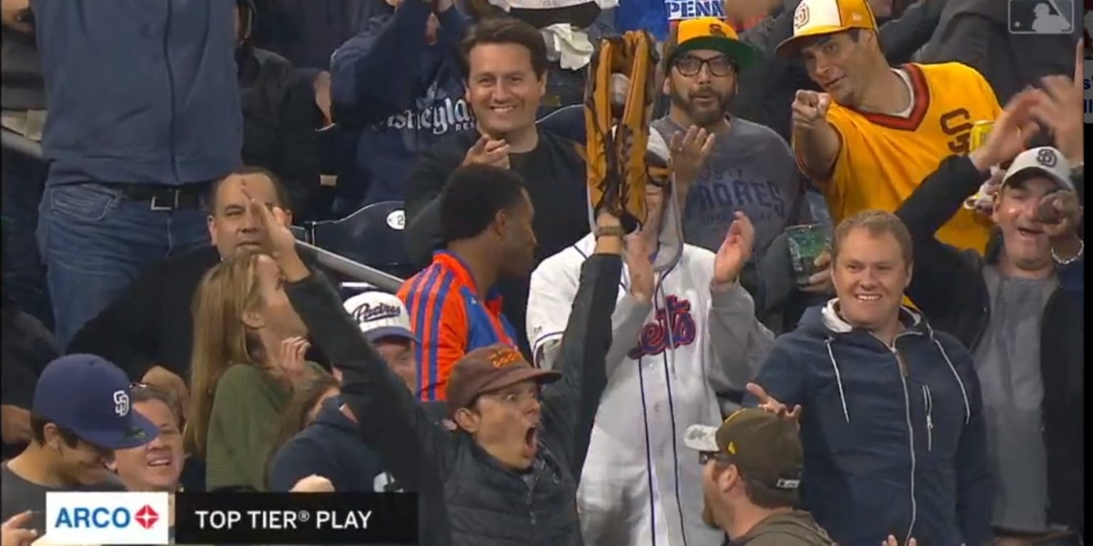 A Padres fan brought a giant glove to Petco Park and was ecstatic when