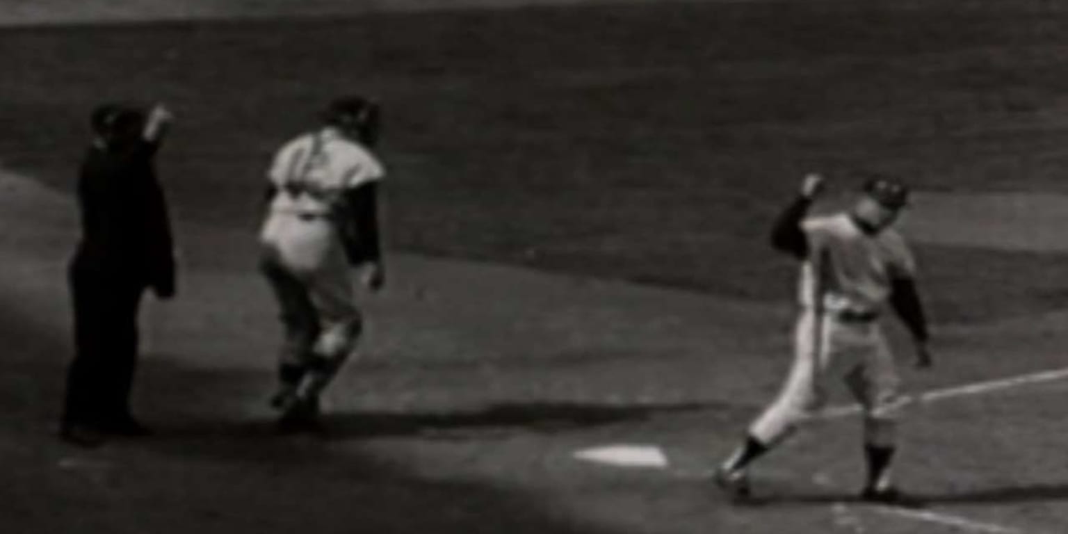 Mickey Mantle- With bat looking towards his right