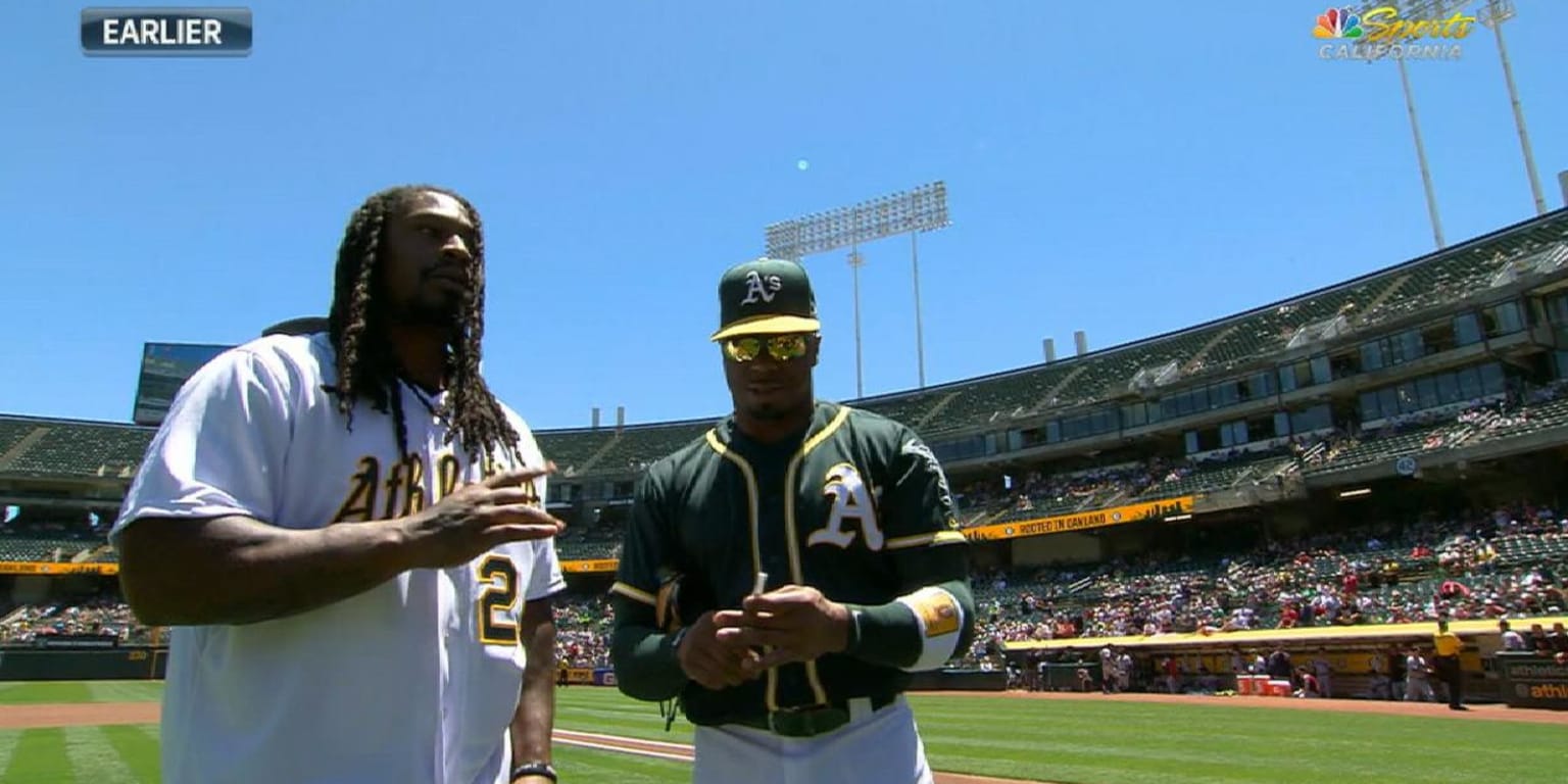 Seahawks RB Marshawn Lynch throws out first pitch at Mariners opener