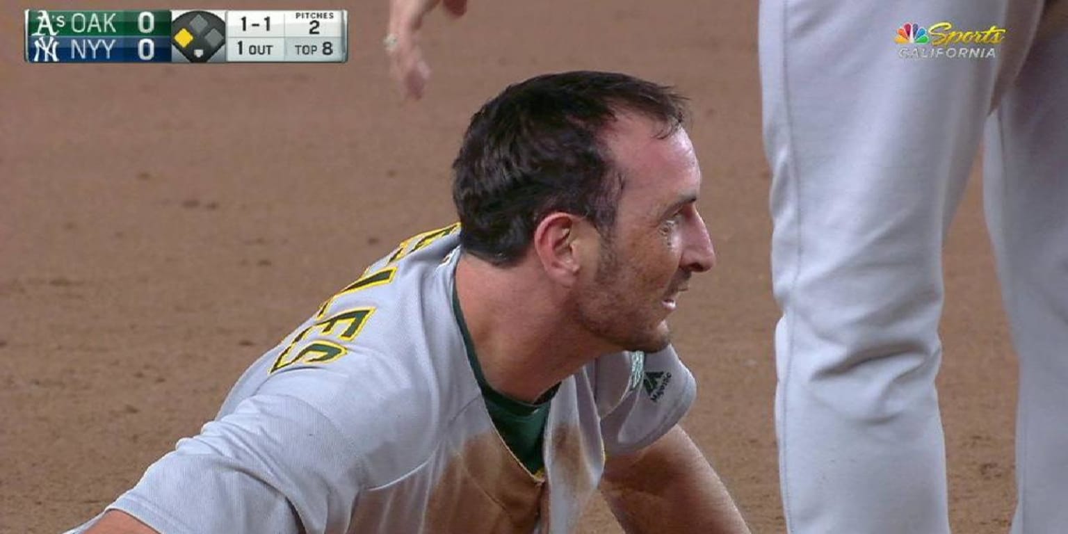 Buster Posey tried to slide headfirst into third base, but the bag won