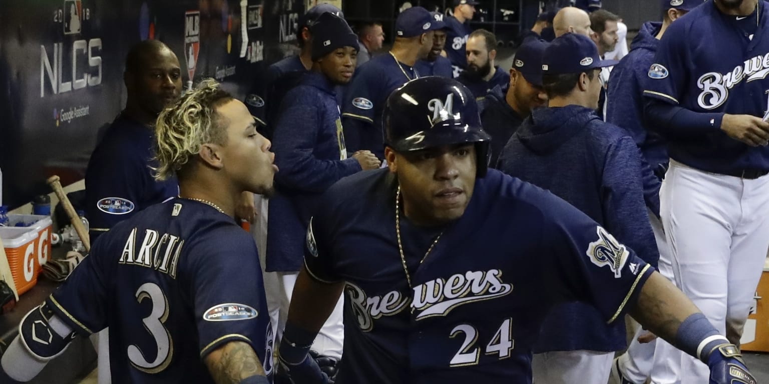 Milwaukee Brewers Player Celebrating After A Win Background