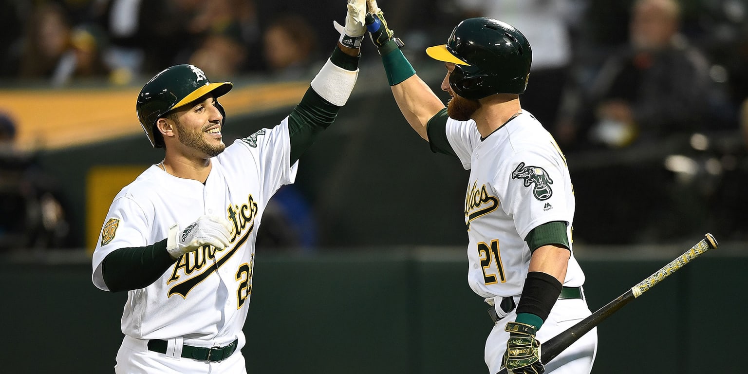 A's Khris Davis crushes home run while wearing jersey signed by