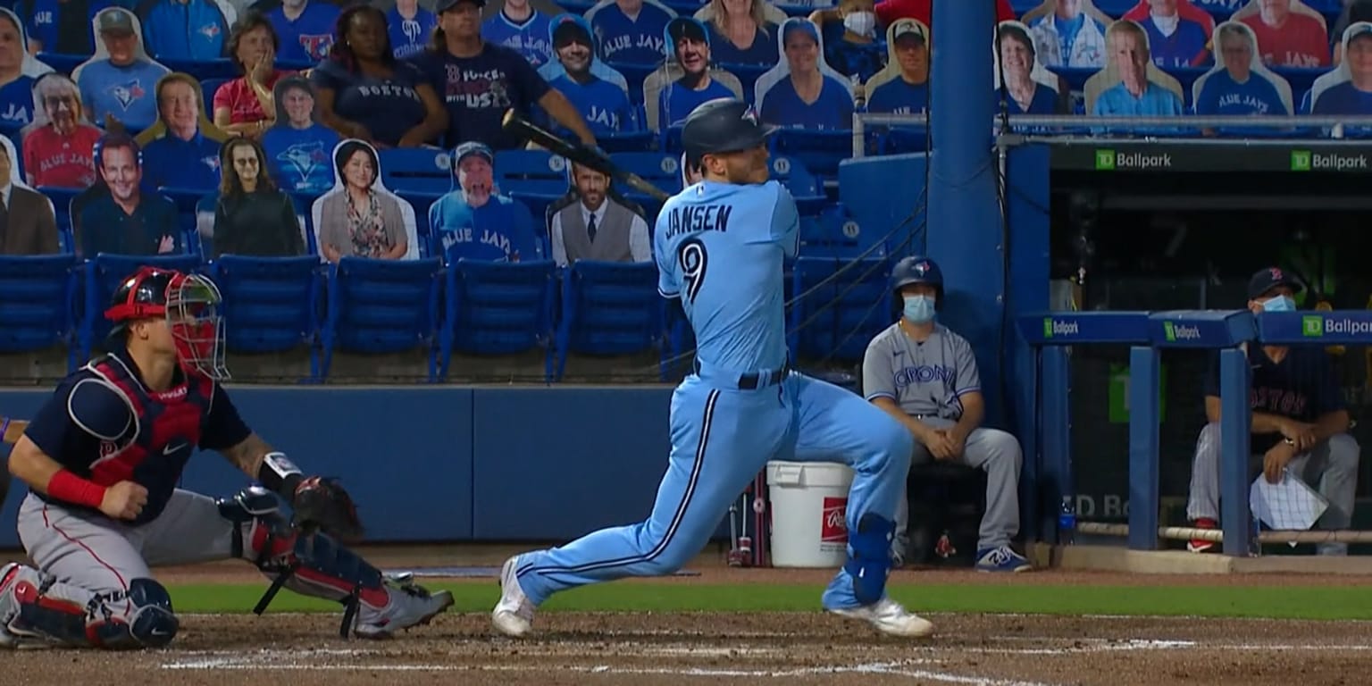 Toronto Blue Jays' Danny Jansen heads to the dugout after being