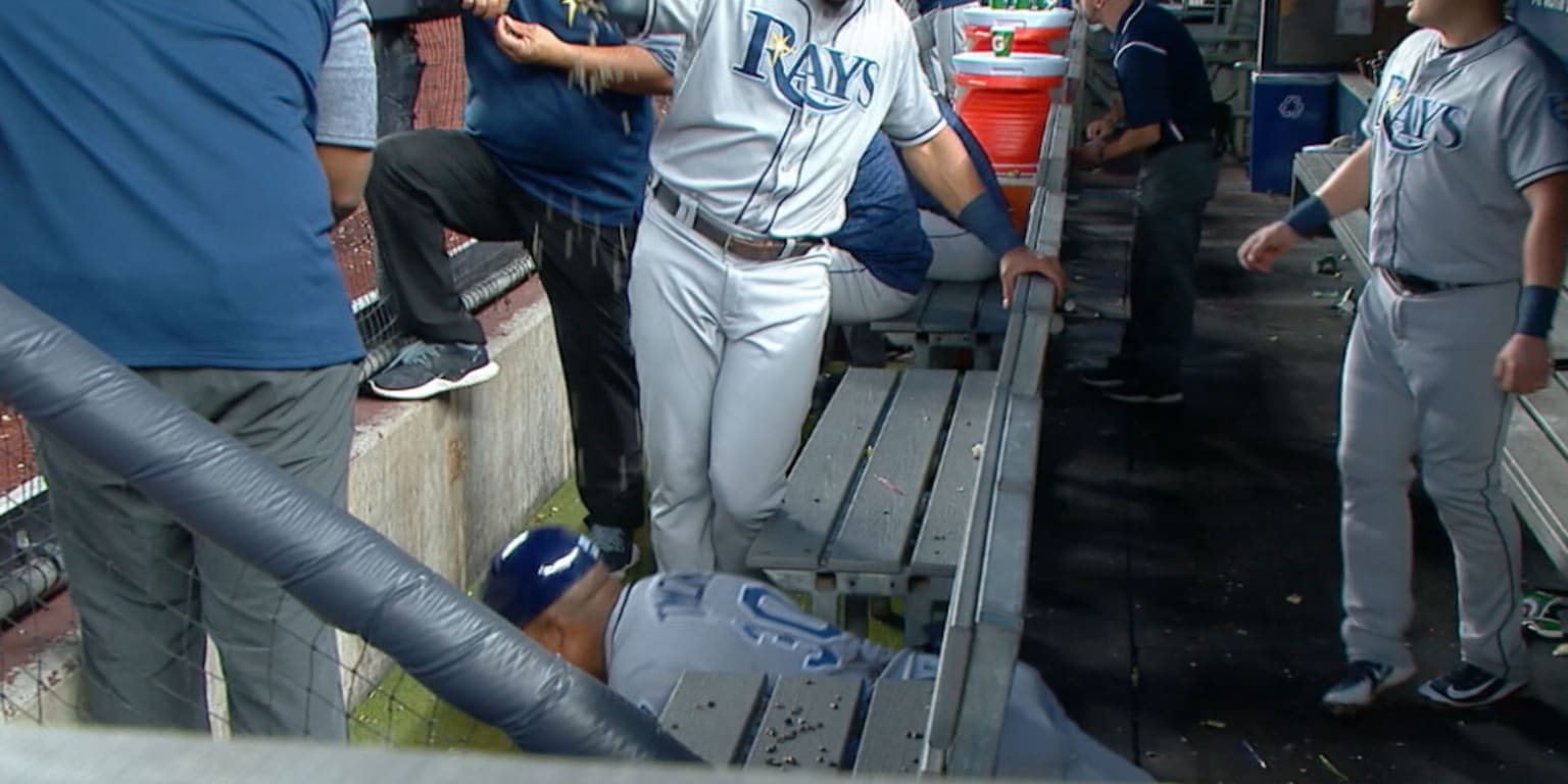 Rays firstbase coach Ozzie Timmons stays in shape by doing pushups