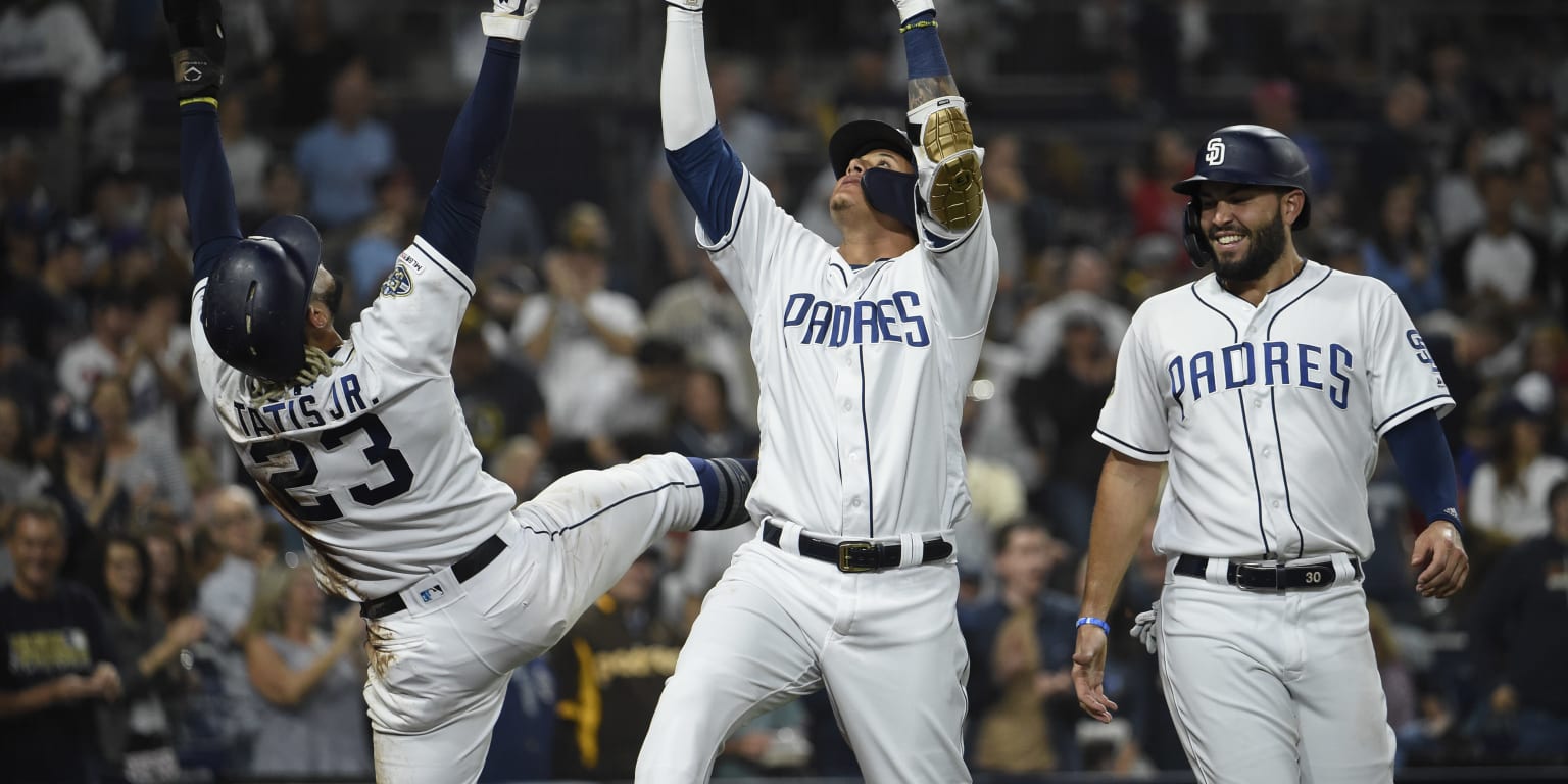 San Diego Padres' Franmil Reyes, left, celebrates his home run against the  Arizona Diamondbacks with Manny Machado during the fourth inning of a  baseball game Thursday, April 11, 2019, in Phoenix. (AP