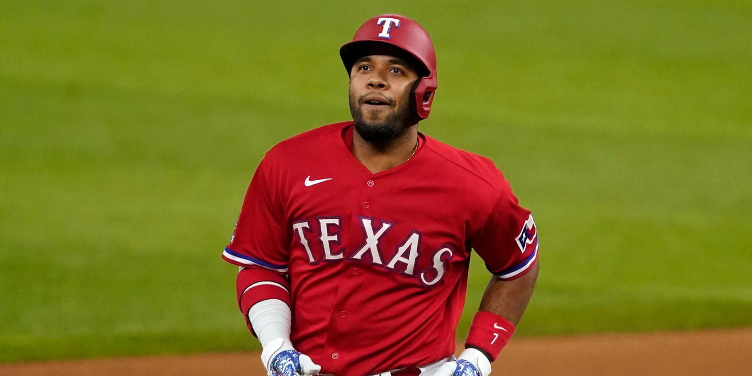 Texas Rangers shortstop Elvis Andrus (1) leaps over Houston Astros