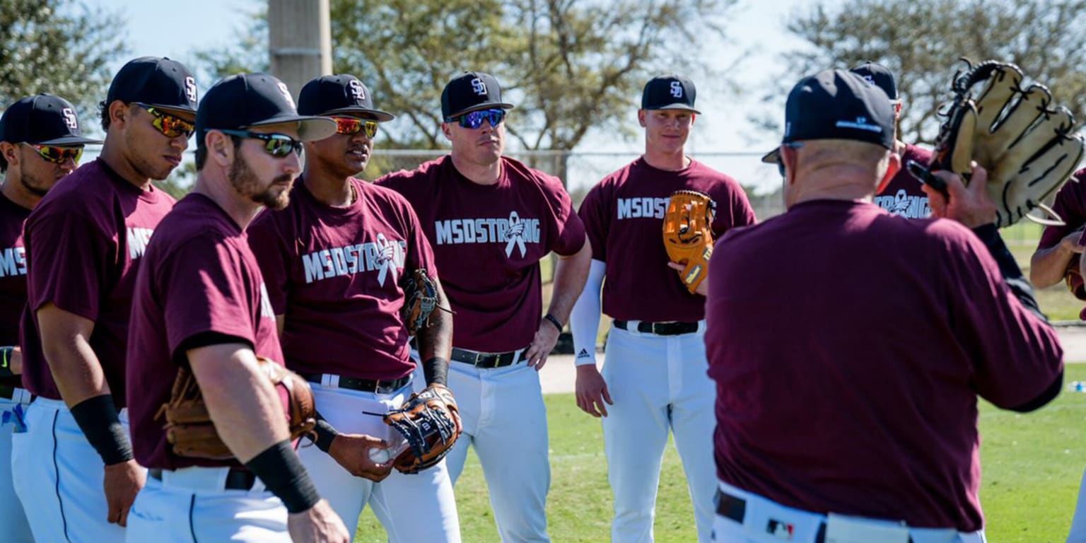 MLB teams wearing Marjory Stoneman Douglas High School caps at