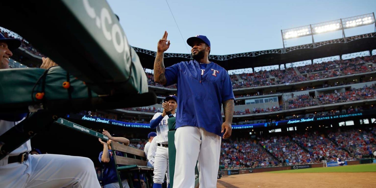 Milwaukee Brewers' Prince Fielder stretches his neck during the