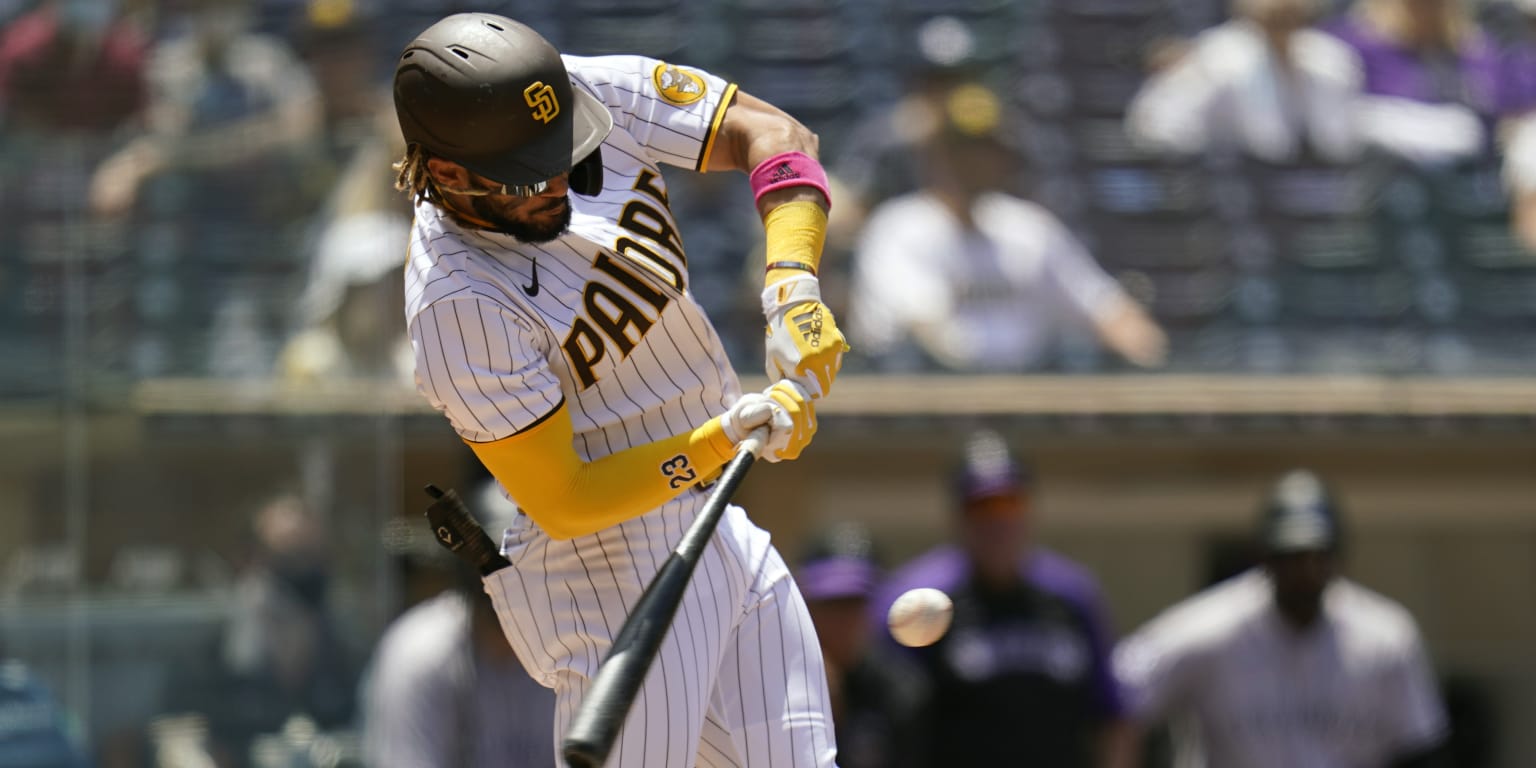 The San Diego Padres batting City Connect jersey helmets sit in