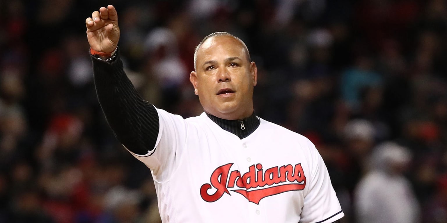 Cleveland baseball legend Carlos Baerga tossed out the first pitch at  Progressive Field before Game 3.