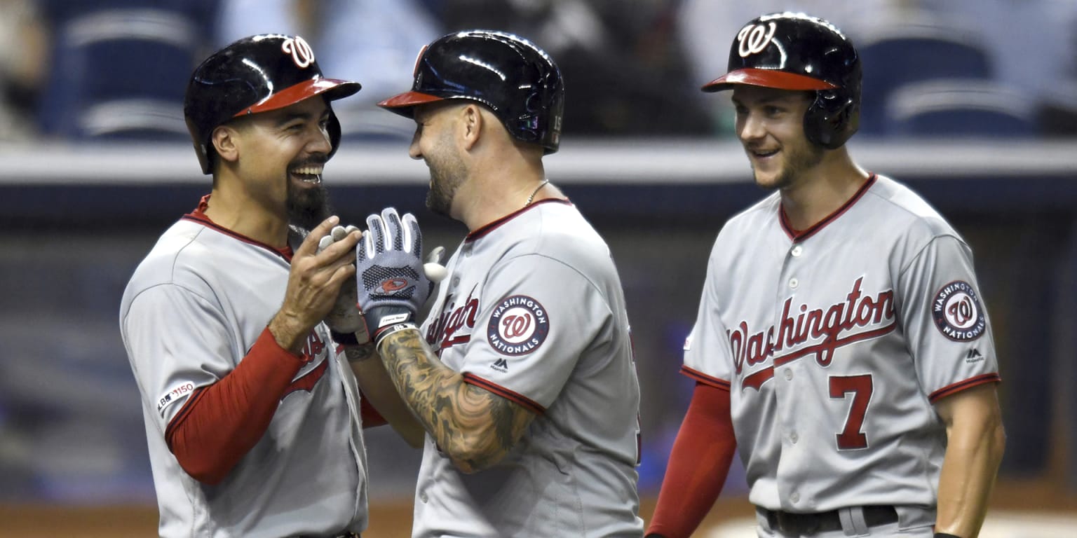 Washington Nationals' Victor Robles climbs the steps to the dugout