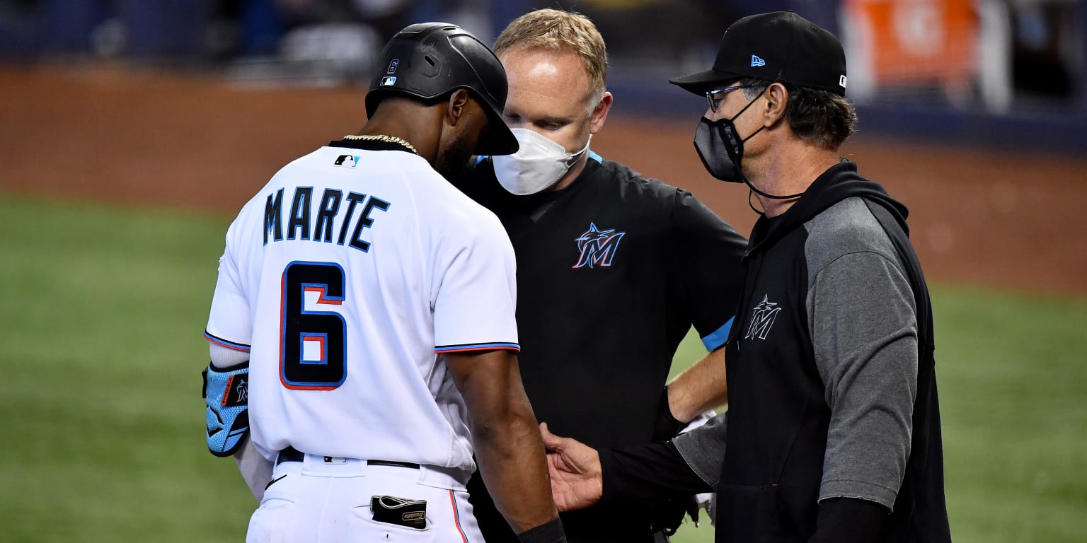LEADING OFF: Marlins' Marte hopes to play with broken hand