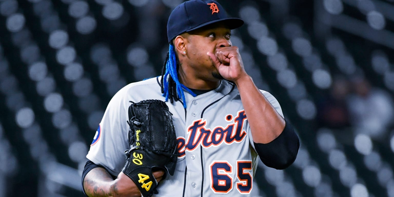 Detroit Tigers shortstop Javier Baez glove flips ball backward