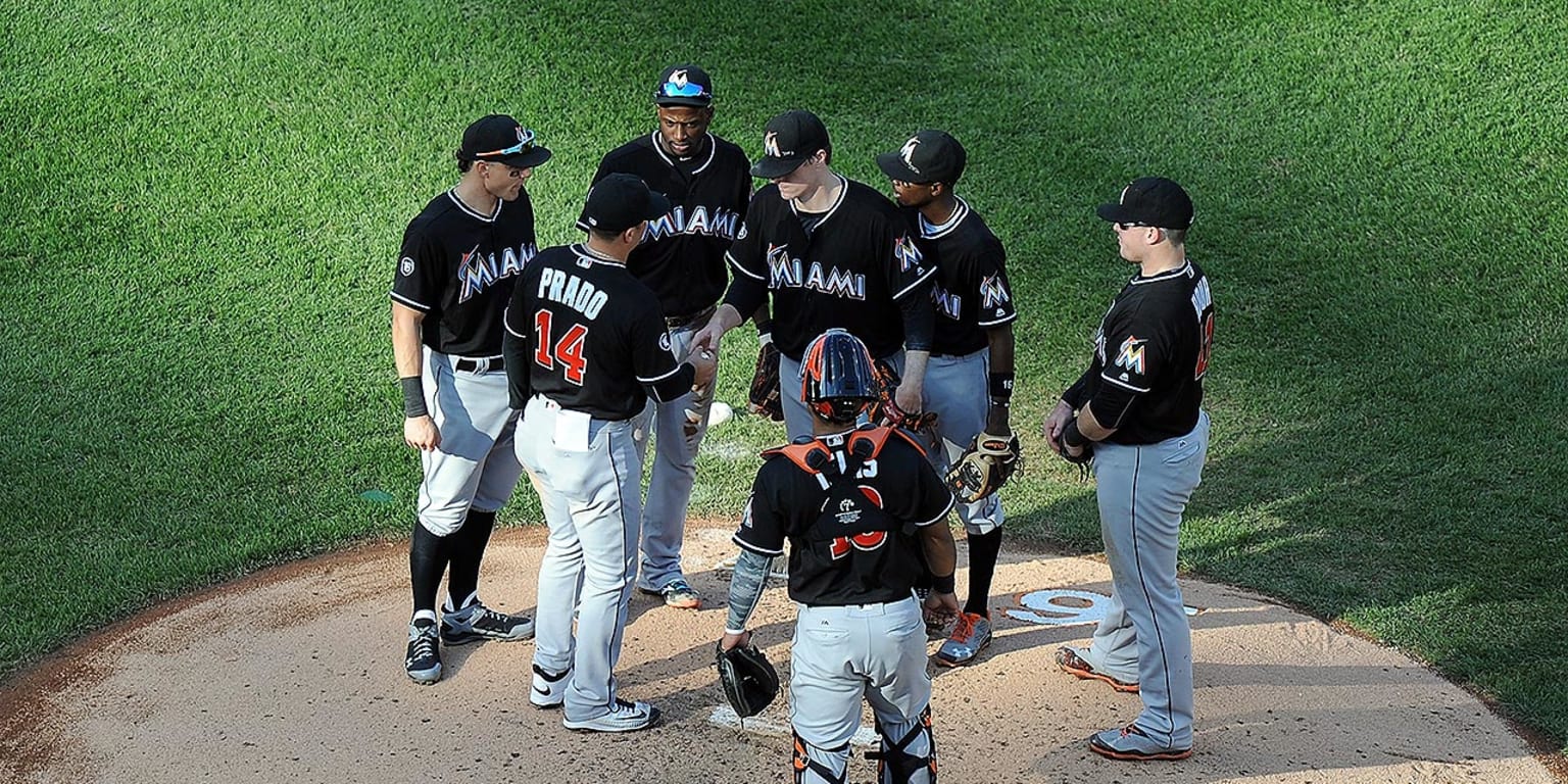 Miami Marlins' Martin Prado hits a single during the third inning