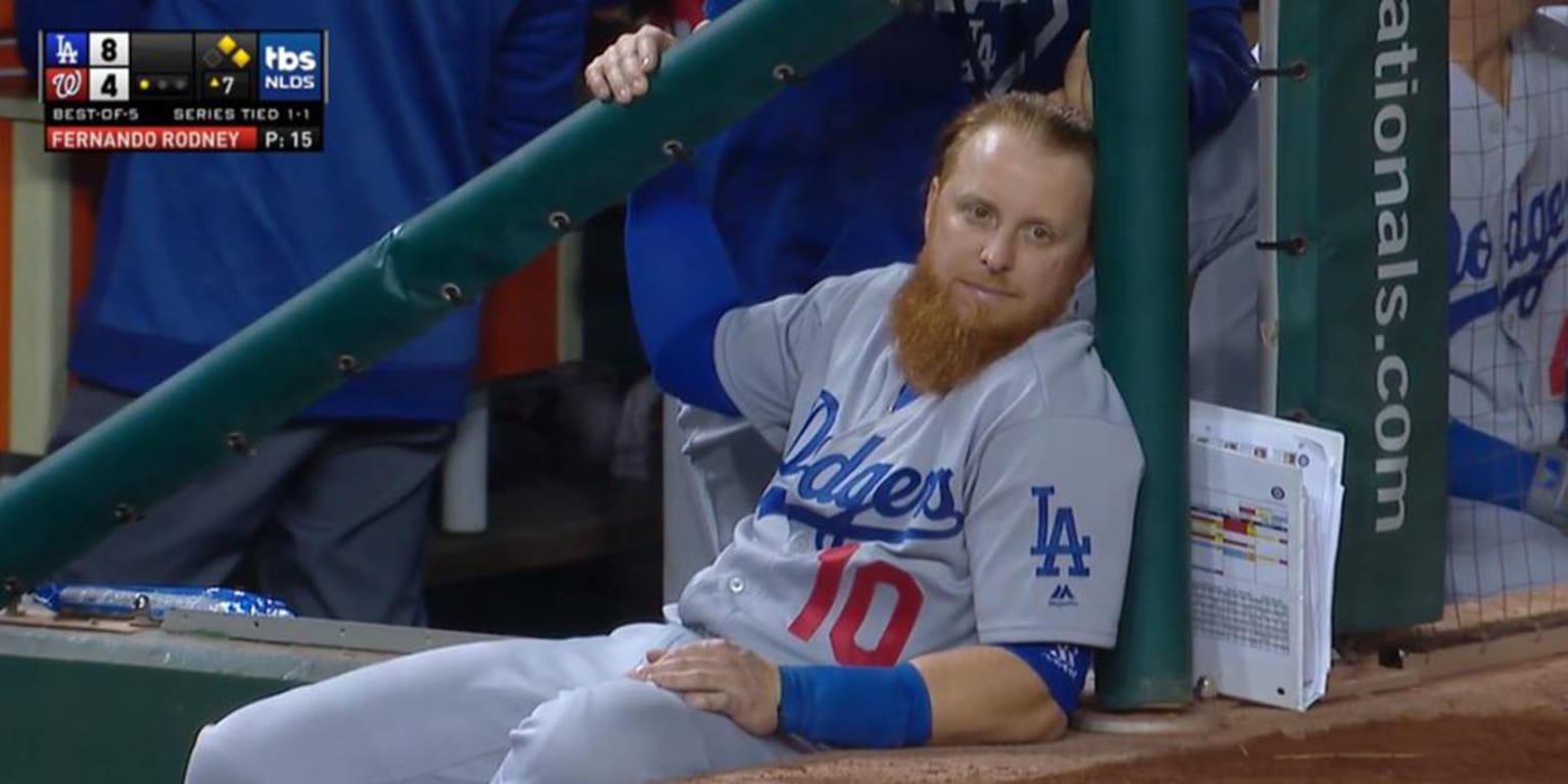 Justin Turner reclining on the dugout steps is a meme