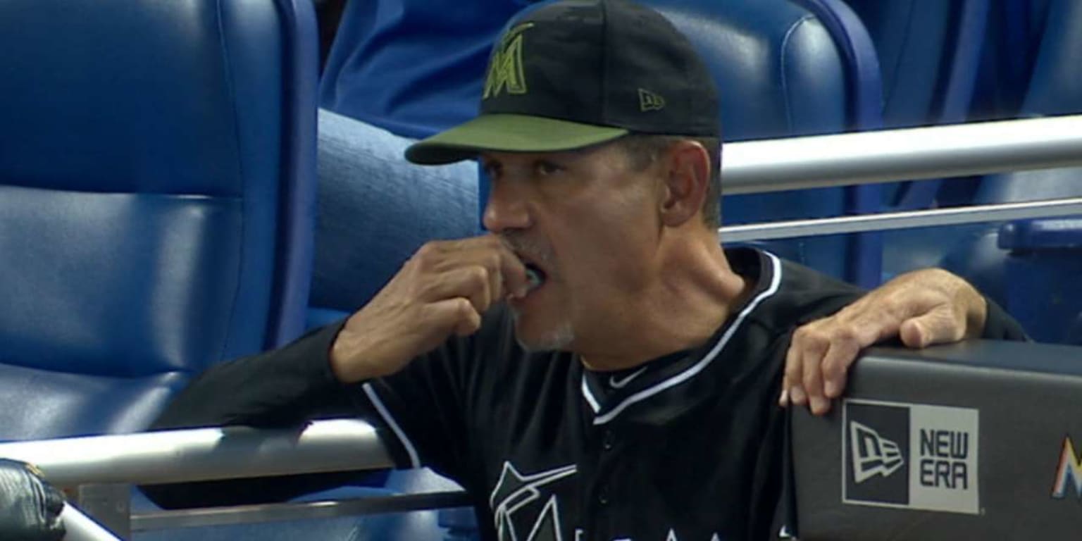 Here's Marlins pitching coach Juan Nieves just flossing his teeth in