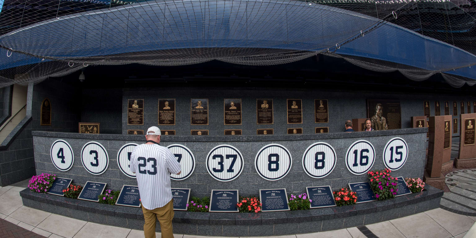 Yankee Stadium: Monument Park - Retired Numbers - Yogi Ber…