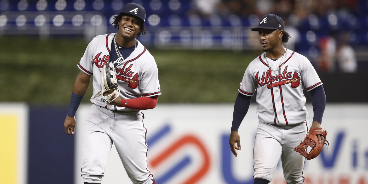 Atlanta Braves' Ronald Acuna Jr., right, celebrates with Ozzie Albies after  a baseball game against the New York Mets Friday, Aug. 11, 2023, in New  York. The Braves won 7-0. (AP Photo/Frank