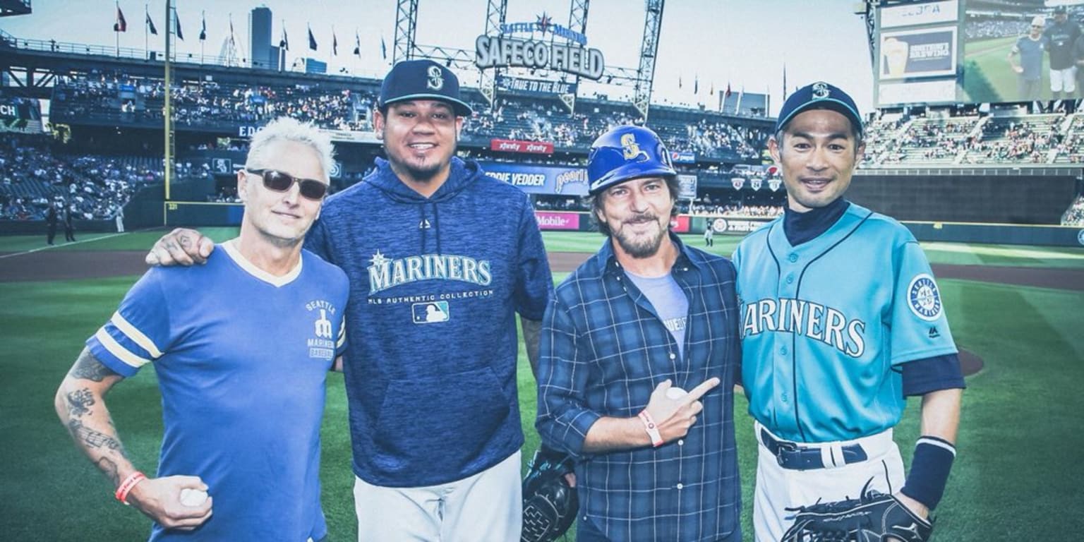 Eddie Vedder wore a batting helmet to throw a first pitch for the