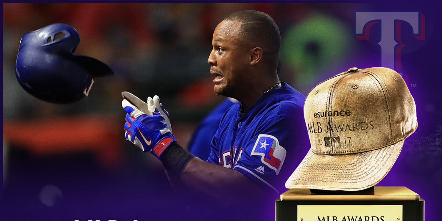 Seattle Mariners' Adrian Beltre smiles at teammate in the dugout