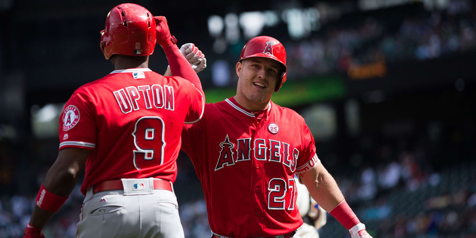 Angels get late Upton double to beat Mariners