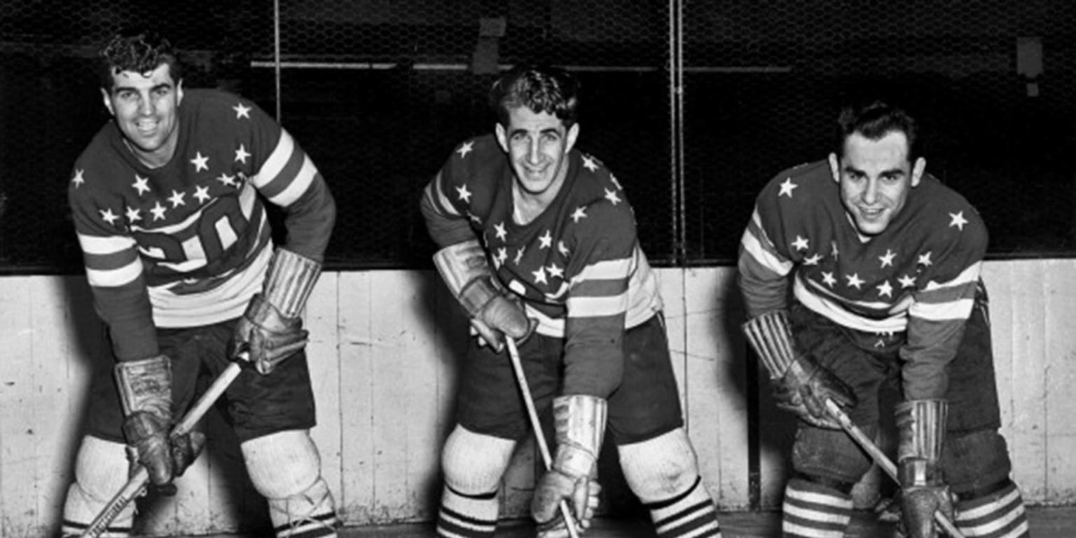 Hall of Fame hockey forward Rod Gilbert, left, and New York Mets