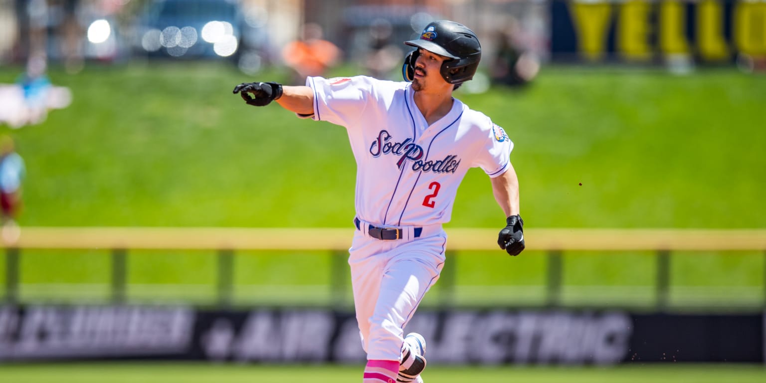 Arizona Diamondbacks' Corbin Carroll follows through on his home run swing  against the Colorado Rockies during the sixth inning of a baseball game  Tuesday, May 30, 2023, in Phoenix. (AP Photo/Ross D.