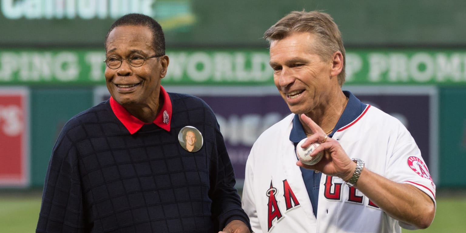 ANAHEIM, CA - APRIL 25: Hall of Fame Rod Carew stands with his wife Rhonda  Carew, and the Dr. Ralf Reuland, the father of the man whose heart Carew  received in a