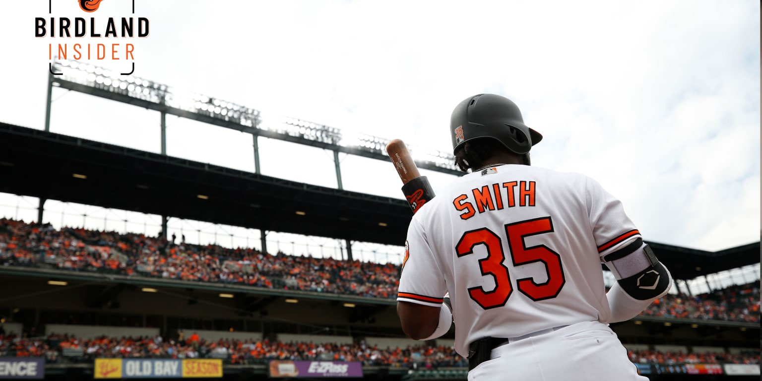 Baltimore Orioles' Dwight Smith Jr., right, is congratulated by